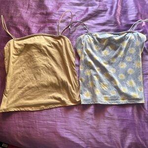 Two camis one tan and one blue with daisies